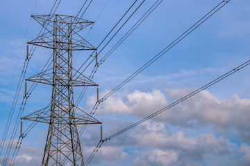 Close up view of high voltage tower with cables