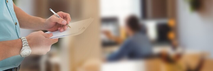 Hands Signing Paper Agreement with home transition