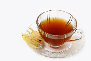 slice of fresh ginger root and tea isolated on white