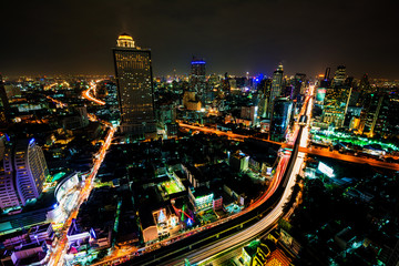 Fototapeta na wymiar The light on the road at night in Bangkok, Thailand on January 1, 2014.