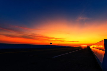 The evening sun on the road in Thailand.