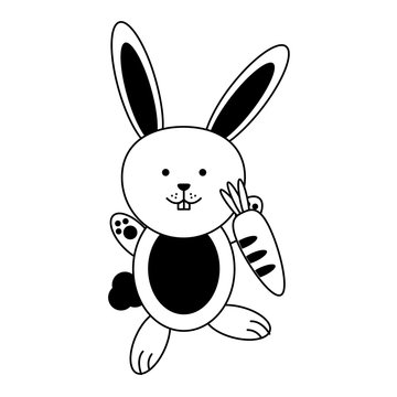 cute rabbit or bunny holding carrot icon image