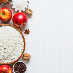 Ingredients for baking on white wooden background