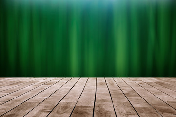 wood terrace with green leaf blur abstract background
