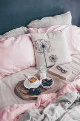 Fototapeta na wymiar Black and pink bedroom in loft style
