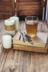 Herbal tea and reading on rustic windowsill
