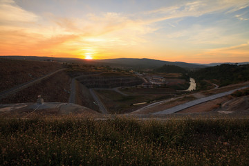 Landscape sunset with cloud at Khwae Noi Bamrungdan dam in Phitsanulok province, Thailand
