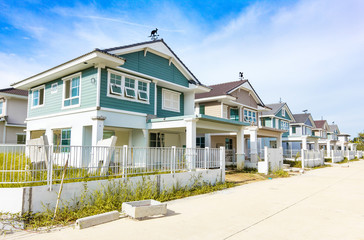 Street view on a row of a new residential house under construction