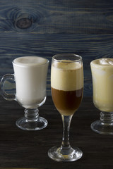 Eggnog on a wooden table. A festive egg drink. Christmas time.