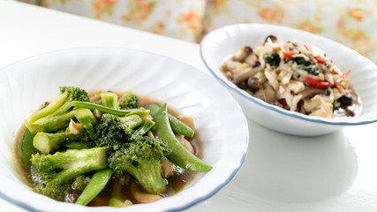 homemade stir-fried vegetable combination and stir-fried crab and mushroom combination