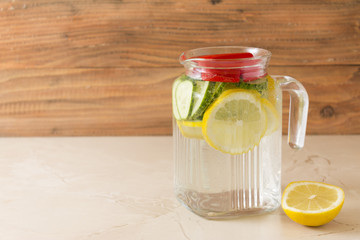 Detox water with lemon and cucumber. Health and body cleansing.