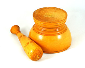 wooden mortar and pestle on white background 