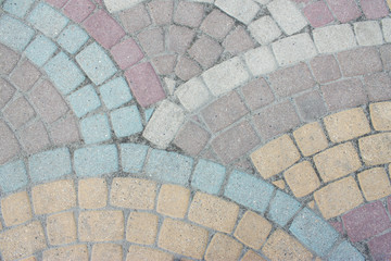 Sidewalk tiles. Background with a concrete, textured surface.