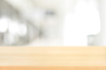 Blurred wood table top on white abstract background