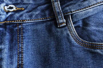 Fragment of jeans trousers. Denim texture.