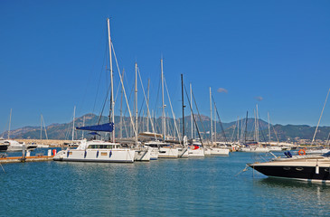 Fototapeta premium Sunny morning in the marina of Salerno with white yachts