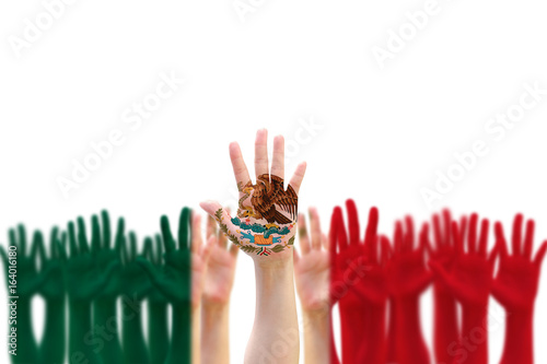 Mexico national flag pattern on people hands raising up for Mexican Independence day celebration and Cinco de Mayo festival