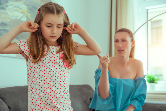 loud mother argue with daughter child