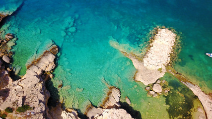 Fototapeta na wymiar Aerial drone photo of small bay of Loutro with turquoise waters, Koufonissi island, small Cyclades, Aegean, Greece