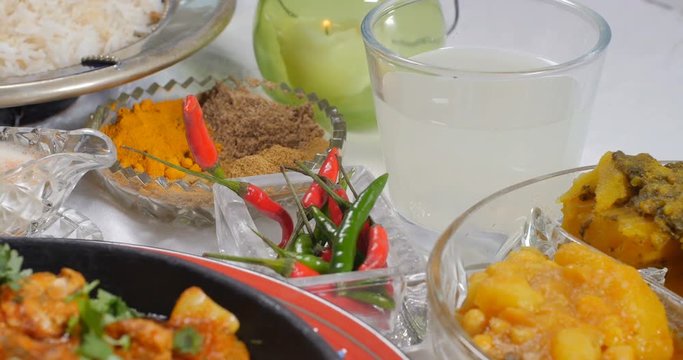 Dolly push out view of a delicious chicken tikka masala with Indian spices