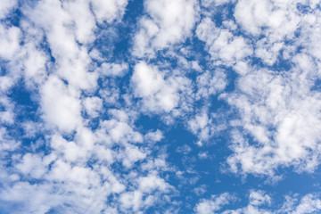 Blue sky and clouds background.