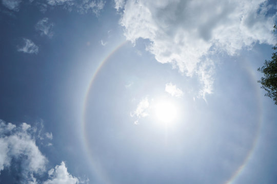 corona of the Sun with bright blue sky in midday