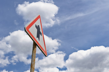 road sign on sky background