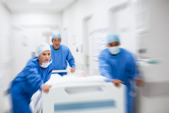 Doctors rushing patient to surgery