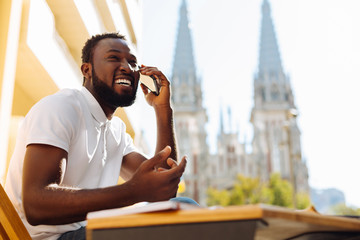 Vibrant sociable man inviting his friend