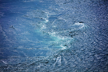 Abstract natural water background, whirlpool. Whirlpool at Saltstraumen, municipality of Bodø in Norway