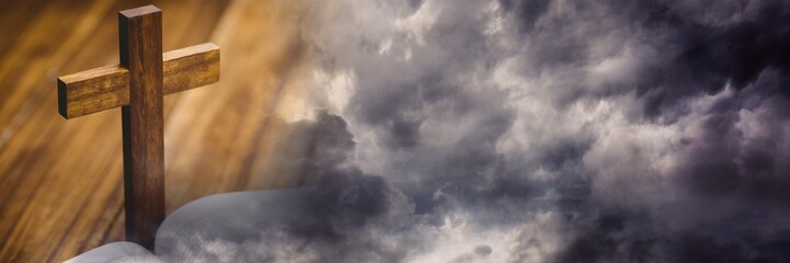 Standing cross on bible and storm cloud  transition - obrazy, fototapety, plakaty