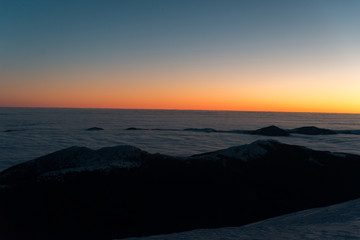 Fototapeta premium scenic sunrise, sunset in the winter mountains. mountain range