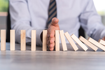 Concept of business control by stopping domino effect