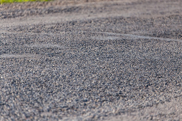 Old black asphalt as background
