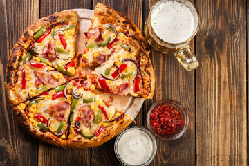 Homemade pizza with bacon, paprika and corn