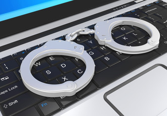 Laptop and Handcuffs Cyber Crime Illustration