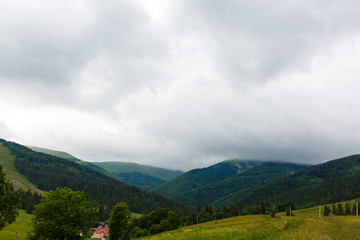 Naklejka premium Photo of rainy clouds in Carpathian mountains