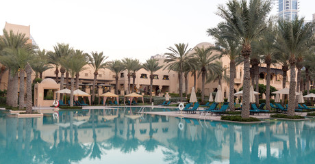 Fototapeta na wymiar Luxury summer resort with a huge swimming pool