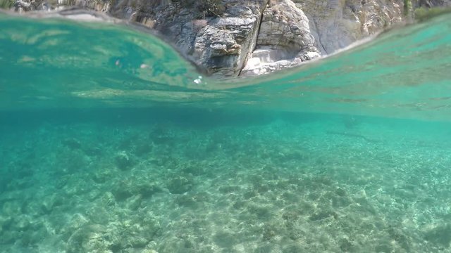 Half underwater close up, backgound split by waterline, Turkey, Mediterranean Sea