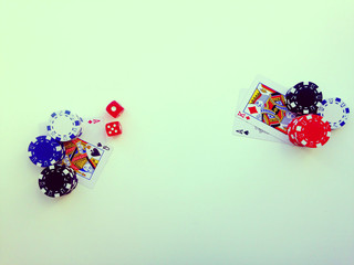 Poker game concept.  Bones, chips and cards view