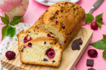 Sweet cake with chocolate and raspberries