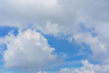 Beautiful white clouds and blue sky background