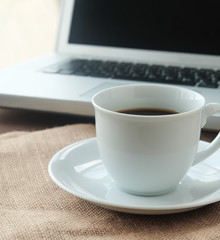 hot black coffee nd blur notebook.