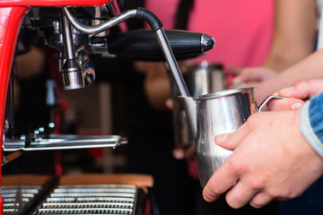 man holding pitcher