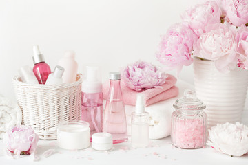 bath and spa with peony flowers beauty products towels