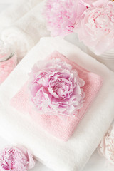 bath and spa with peony flowers towels
