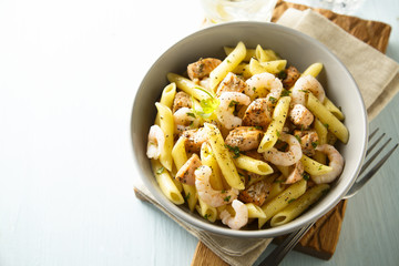 Pasta with fried salmon and shrimps