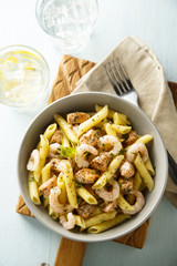 Pasta with fried salmon and shrimps
