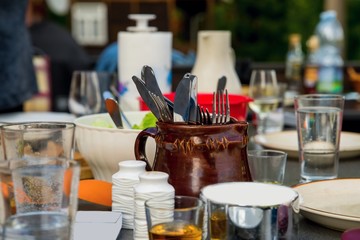 Table full of kitchen and food accessories.