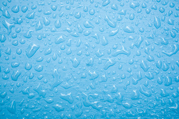 Water drops on blue board texture and background, copy space ready for your background design.